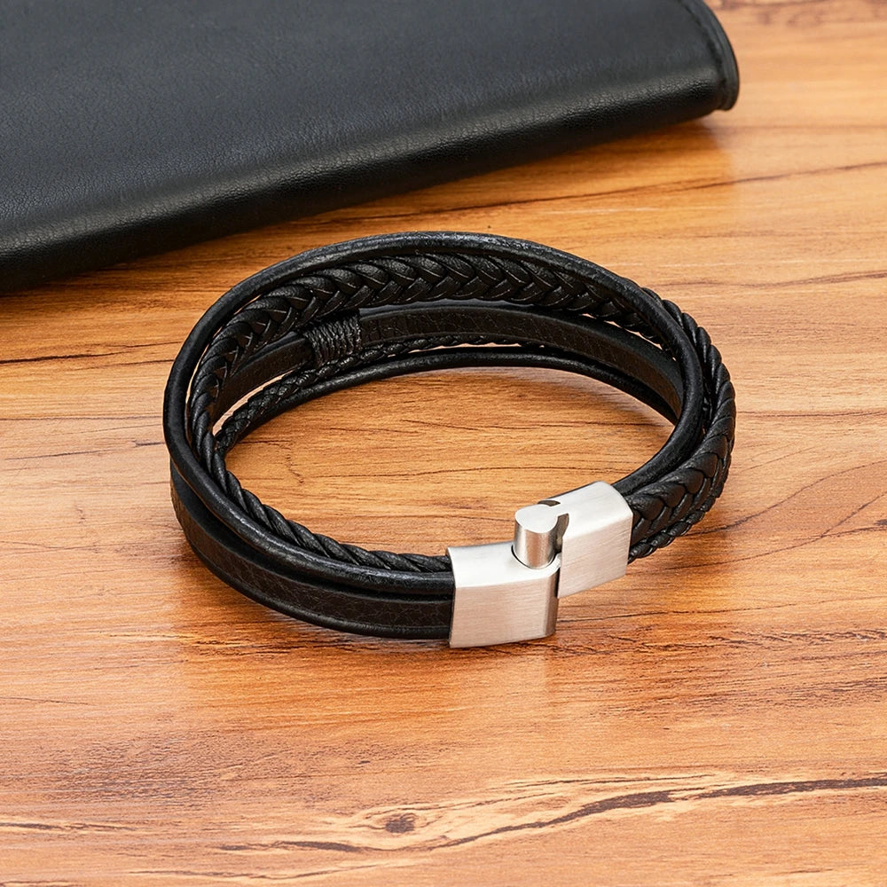 Pulseira Masculina XQNI Luxo em Couro Trançado – Multicamadas com Aço Inoxidável