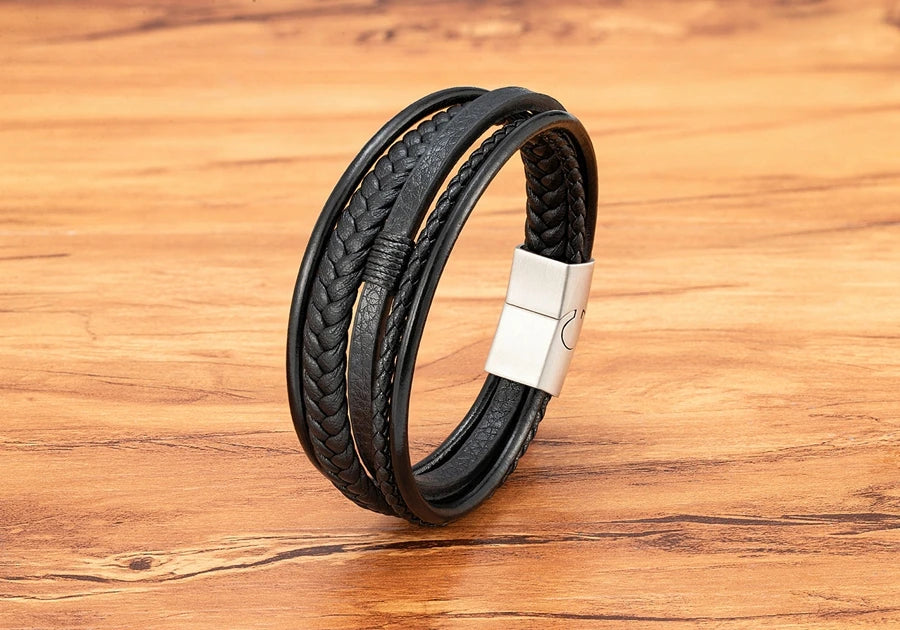 Pulseira Masculina XQNI Luxo em Couro Trançado – Multicamadas com Aço Inoxidável