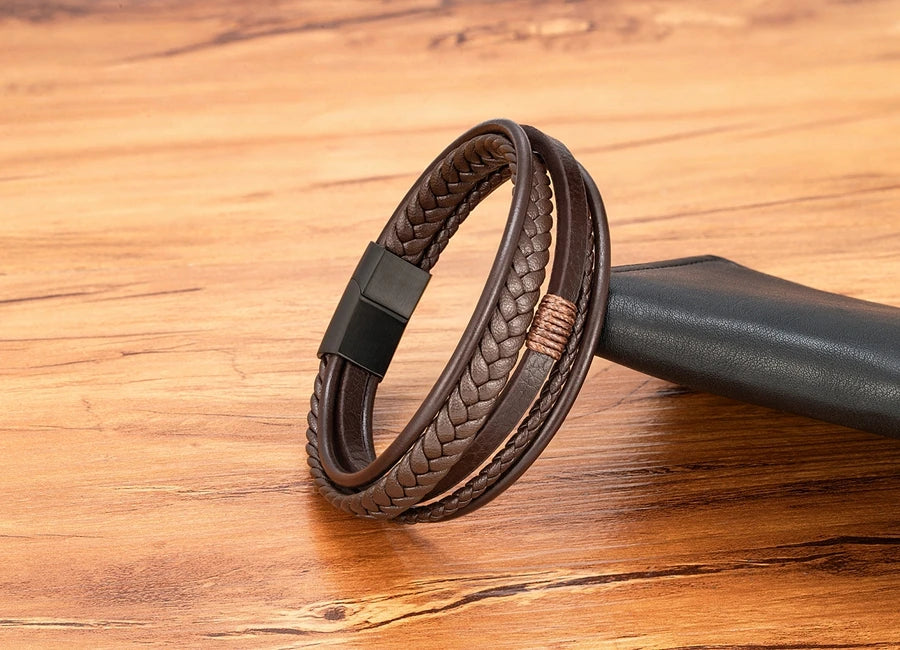 Pulseira Masculina XQNI Luxo em Couro Trançado – Multicamadas com Aço Inoxidável