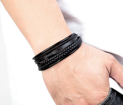 Pulseira Masculina XQNI Luxo em Couro Trançado – Multicamadas com Aço Inoxidável