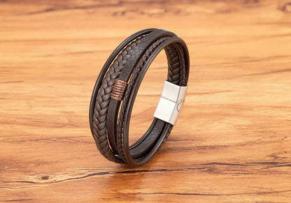 Pulseira Masculina XQNI Luxo em Couro Trançado – Multicamadas com Aço Inoxidável